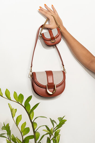 Charles and keith saddle on sale bag