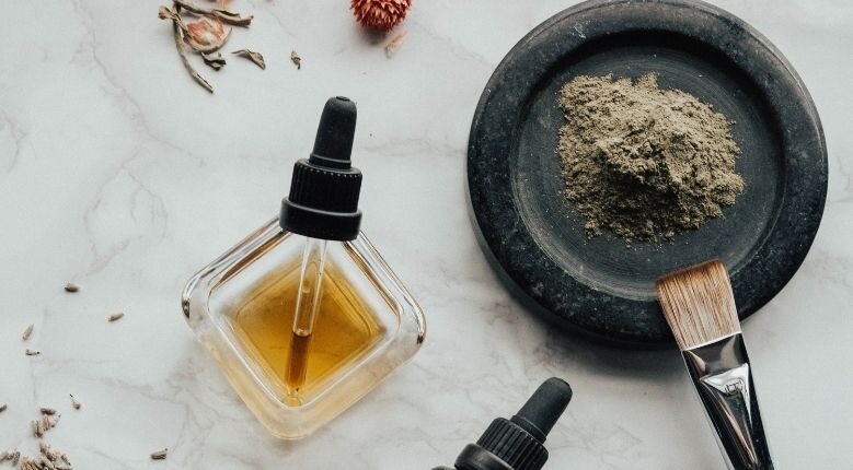 Purifying Black Magnelight Facial at Spa Infinity Face oil and charcoal face mask
