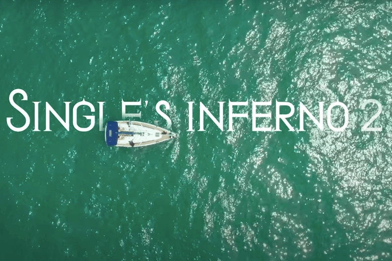 Photo of boat on open ocean with overlay text “Single’s Inferno” Season 2